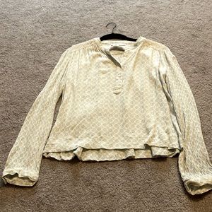 Cream and light blue print blouse with embroidery.